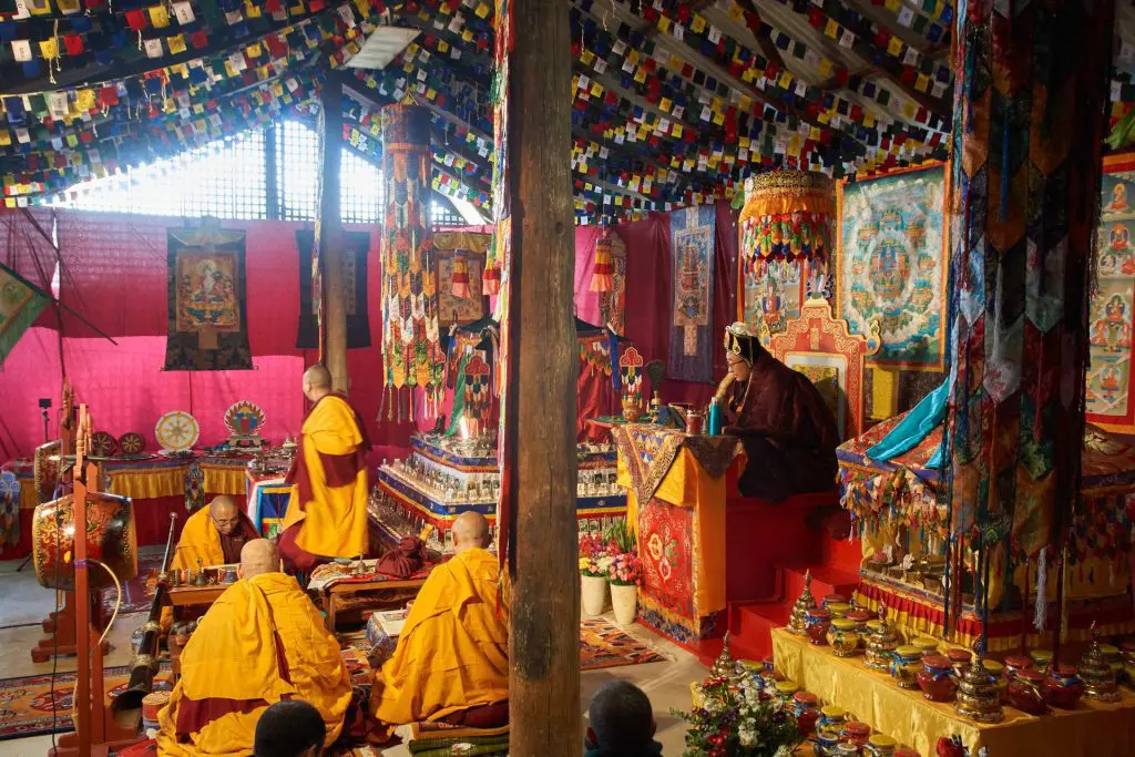 Khentrul Rinpoche, joined by other lamas, performing a ceremonial blessing for the Land of Shambhala, infusing the land with spiritual energy and protection.
