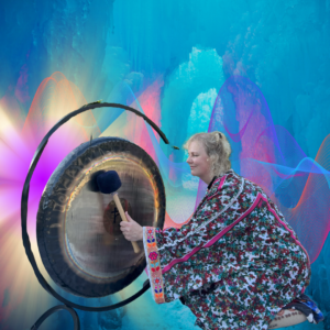 Tanya plays the gong, fostering inner peace and clarity through sound.